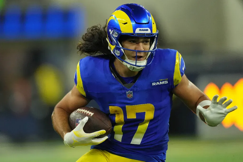 Nov 11, 2024; Inglewood, California, USA; Los Angeles Rams wide receiver Puka Nacua (17) carries the ball against the Miami Dolphins at SoFi Stadium. Mandatory Credit: Kirby Lee-Imagn Images