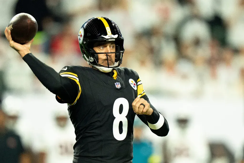 USATSI 27341619 - Portrait with football in action.