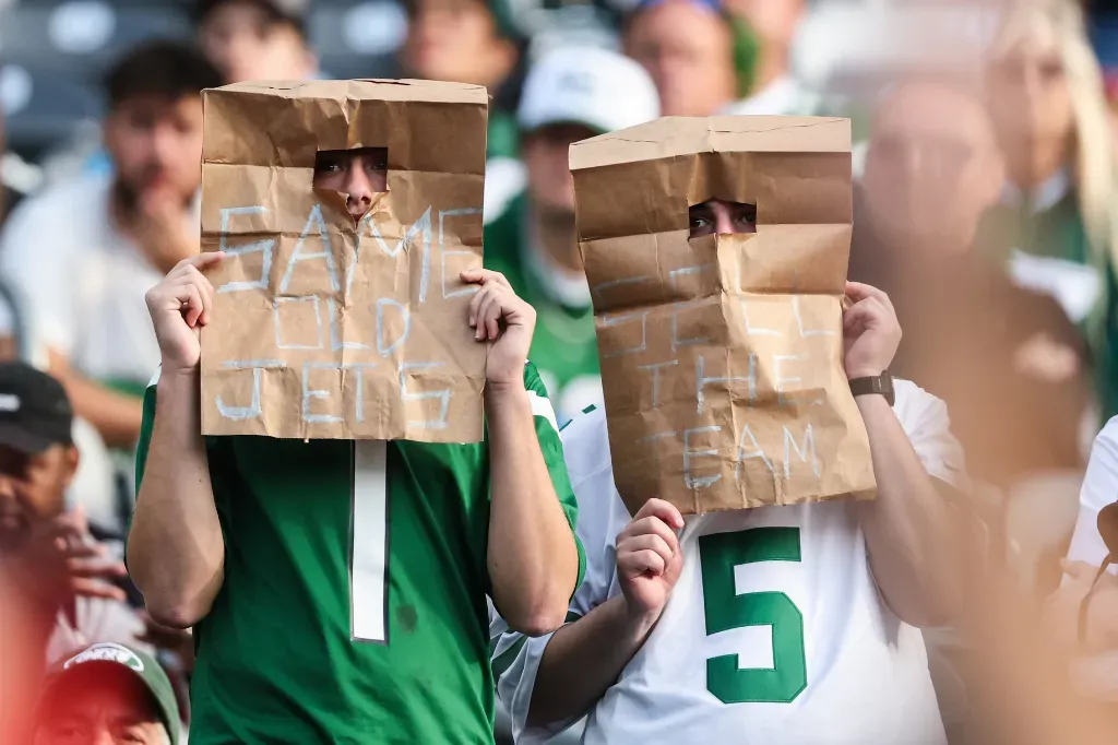 USATSI 27370568 - Photo of fans with paper bags.