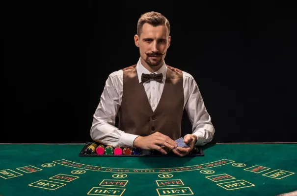 Image 177 - Portrait with a dealer at a casino table.
