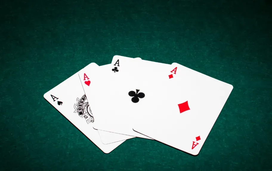 Image 183 - Photo of playing cards with aces.