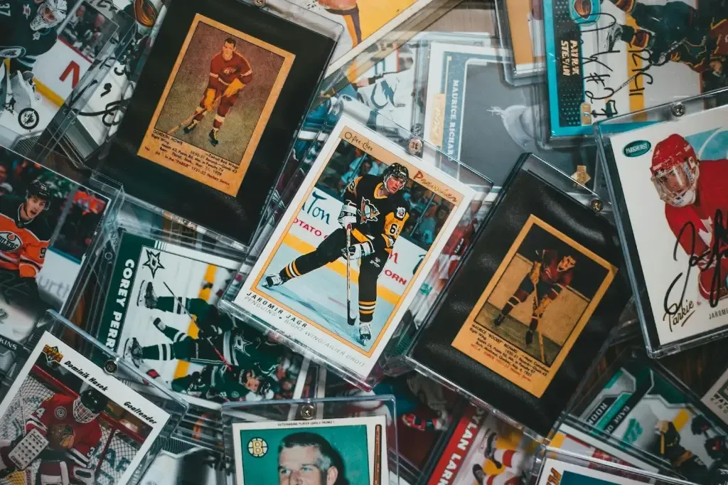 Image 286 - Sports card collection with hockey memorabilia.