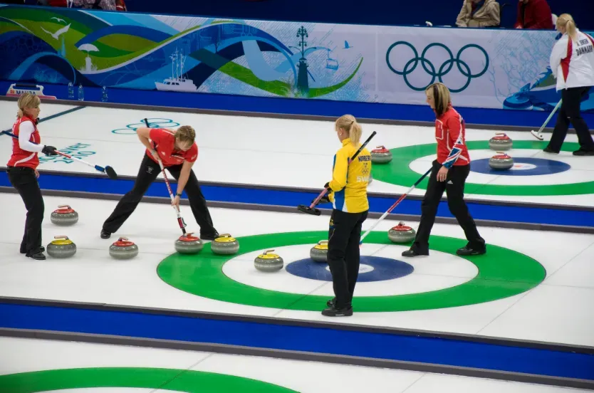 Curling - Sports Photo with players on ice.